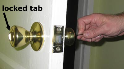 ... clockwise. This should turn the locking tab too, unlocking the door